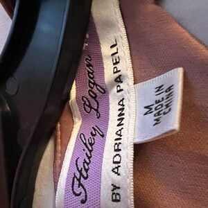 2 dresses.  1 gold shimmering, 1 pink shimmering